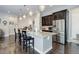 Kitchen island with hardwood floors and ample seating space at 4767 S Odessa St, Centennial, CO 80015
