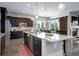 Spacious kitchen with stainless steel appliances and a large island at 4767 S Odessa St, Centennial, CO 80015