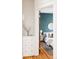 Bedroom view with decorative rug, furnishings and teal accent wall at 2355 Forest St, Denver, CO 80207
