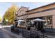 Outside view of Honey Hill Cafe showcasing the outdoor seating area and welcoming ambiance on a bright day at 2355 Forest St, Denver, CO 80207