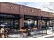 The restaurant Bistro Vendome has outdoor seating on the street with tables and chairs at 2355 Forest St, Denver, CO 80207