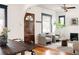 Inviting living room with hardwood floors, modern furnishings, arched doorway, and lots of natural light at 2355 Forest St, Denver, CO 80207