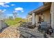 Well-maintained backyard with patio area and golf course view at 4749 Old Post Ct, Boulder, CO 80301