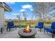 Picturesque backyard with comfortable seating area and cozy fire pit at 4749 Old Post Ct, Boulder, CO 80301