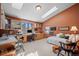 Bedroom features large windows and skylights that illuminate a built-in desk and storage unit at 4749 Old Post Ct, Boulder, CO 80301