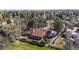 Aerial view of a home showing the outdoor patio, well-manicured lawn, and mature landscaping at 4749 Old Post Ct, Boulder, CO 80301