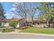 Attractive home exterior with lush landscaping and an inviting front walkway and entrance at 4749 Old Post Ct, Boulder, CO 80301