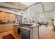 Updated kitchen features a breakfast bar, modern appliances, and an open floor plan at 4749 Old Post Ct, Boulder, CO 80301