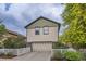 Charming two-story home with neutral siding, attached garage, and a delightful picket fence creating curb appeal at 5892 W 94Th Pl, Westminster, CO 80031