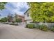 Charming two-story home with neutral siding, attached garage, and a delightful picket fence creating curb appeal at 5892 W 94Th Pl, Westminster, CO 80031
