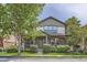 Charming two-story home with a covered front porch, manicured landscaping, and a welcoming curb appeal at 5892 W 94Th Pl, Westminster, CO 80031