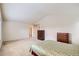 Bright and airy main bedroom with neutral carpet, vaulted ceiling, and ample closet space at 5892 W 94Th Pl, Westminster, CO 80031