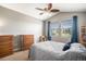 Spacious bedroom with vaulted ceiling, soft grey walls, and plush carpeting at 23235 York Ave, Parker, CO 80138