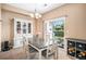 Bright dining room with sliding glass doors to the outdoor patio at 23235 York Ave, Parker, CO 80138