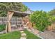 Cozy backyard patio with a gazebo and comfortable seating, perfect for relaxing at 10223 W 77Th Dr, Arvada, CO 80005