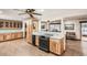 Open kitchen featuring stainless steel appliances, sleek countertops, and ample cabinet space at 10223 W 77Th Dr, Arvada, CO 80005