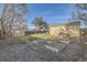 Spacious backyard with garden beds, a shed, and a well-maintained lawn for outdoor activities at 3493 S Eudora St, Denver, CO 80222