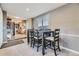 Dining room with seating and a barn door at 3493 S Eudora St, Denver, CO 80222