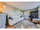 Bright living room featuring modern gray walls, hardwood flooring, and comfortable seating at 3493 S Eudora St, Denver, CO 80222