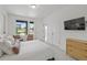 Serene bedroom with scenic views, warm decor, and access to additional rooms, creating a peaceful retreat at 16722 Shoshone St, Broomfield, CO 80023