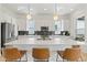 Stunning kitchen with quartz counters, subway tile, and stainless steel appliances, perfect for culinary enthusiasts at 16722 Shoshone St, Broomfield, CO 80023