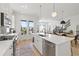 Bright kitchen with stainless steel appliances and a center island at 16722 Shoshone St, Broomfield, CO 80023