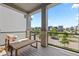 Covered patio with comfortable seating and neighborhood views at 16722 Shoshone St, Broomfield, CO 80023