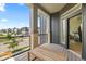 Relaxing outdoor patio with serene neighborhood views and comfortable seating at 16722 Shoshone St, Broomfield, CO 80023