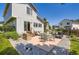 Backyard patio with an outdoor dining and lounge area, perfect for entertaining guests at 4276 S Tempe Ct, Aurora, CO 80018