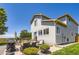 Back exterior view of a two-story home with a patio and outdoor seating at 4276 S Tempe Ct, Aurora, CO 80018
