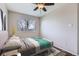 Bedroom with ceiling fan and decor at 4620 E 135Th Way, Thornton, CO 80241