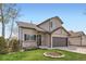 Well-maintained two-story home with a lush lawn, mature trees, and inviting curb appeal at 4620 E 135Th Way, Thornton, CO 80241