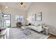 Inviting living room with ample natural light, stylish furniture, and contemporary decor at 4620 E 135Th Way, Thornton, CO 80241