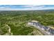 Expansive aerial view of luxury homes in a green community with scenic views at 3459 Hotpepper Way, Castle Rock, CO 80108