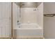 Clean bathroom with a bathtub and shower at 9343 Amison Cir # 103, Parker, CO 80134