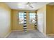 Bright bedroom with neutral walls, ceiling fan, and carpet flooring at 9343 Amison Cir # 103, Parker, CO 80134