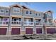 Three-story townhome with attached garage at 9343 Amison Cir # 103, Parker, CO 80134