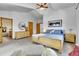 Serene main bedroom featuring vaulted ceilings, neutral colors, and an ensuite bathroom for added privacy at 5254 Cheyenne Rd, Indian Hills, CO 80454