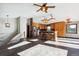 Bright open kitchen with wood cabinets, unique lighting and stainless steel appliances at 28553 Birch Ln, Conifer, CO 80433