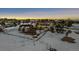 Aerial view of house and expansive lot in snowy landscape at 2776 Savage Rd, Elizabeth, CO 80107