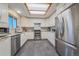 Modern kitchen featuring stainless steel appliances and granite countertops at 2776 Savage Rd, Elizabeth, CO 80107