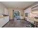 Home office with built-in shelving and desk, near patio access at 2776 Savage Rd, Elizabeth, CO 80107