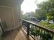 Comfortable balcony showcasing a relaxing outdoor living space with a chair and view at 7355 S Alkire St # 203, Littleton, CO 80127