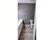 Bright bathroom with modern vanity, hardware and wood-style flooring at 7355 S Alkire St # 203, Littleton, CO 80127