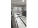 A living room with a fireplace and balcony at 7355 S Alkire St # 203, Littleton, CO 80127