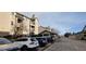 Community with parking with designated carport and parking lot at 7355 S Alkire St # 203, Littleton, CO 80127