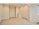 Spacious finished basement with neutral carpet, white trim, and ample natural light at 3810 Urban St, Wheat Ridge, CO 80033