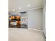 A bright living room with skylights offers an open view to a kitchen area at 3810 Urban St, Wheat Ridge, CO 80033