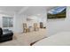Versatile basement area with modern decor and comfortable seating for entertainment and relaxation at 5944 S Yank Ct, Littleton, CO 80127