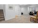 Finished basement area with carpeted flooring, open layout, and a cozy seating area for relaxation at 5944 S Yank Ct, Littleton, CO 80127
